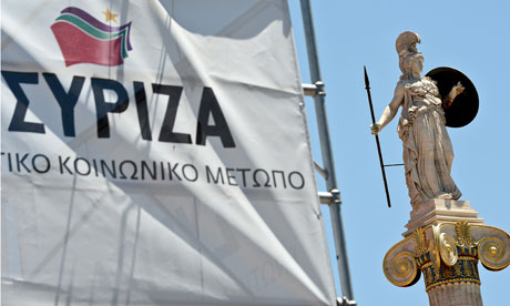 A statue of Athena, patron of Athens, is seen near a Syriza party election campaign kiosk